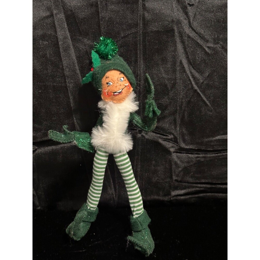 Annalee 10” 2004 Green Elf with striped leggings and white faux fur, poseable.